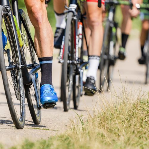 detail of bike and feet of a cyclist in a bicycle race